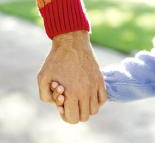 man holding childs hand child anger management
